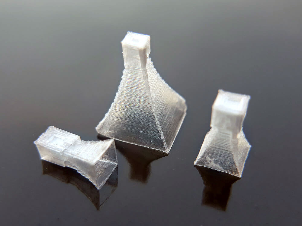 narrow pyramid salt crystals shaped like chess pieces